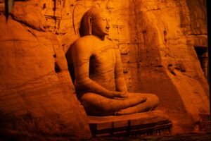 Explore the serene rock-cut Buddha statue at Gal Vihara in Polonnaruwa, Sri Lanka, a symbol of Buddhist heritage.