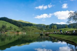 Explore the serene beauty of Sembuwatta Lake with lush greenery and clear skies in Matale, Sri Lanka.
